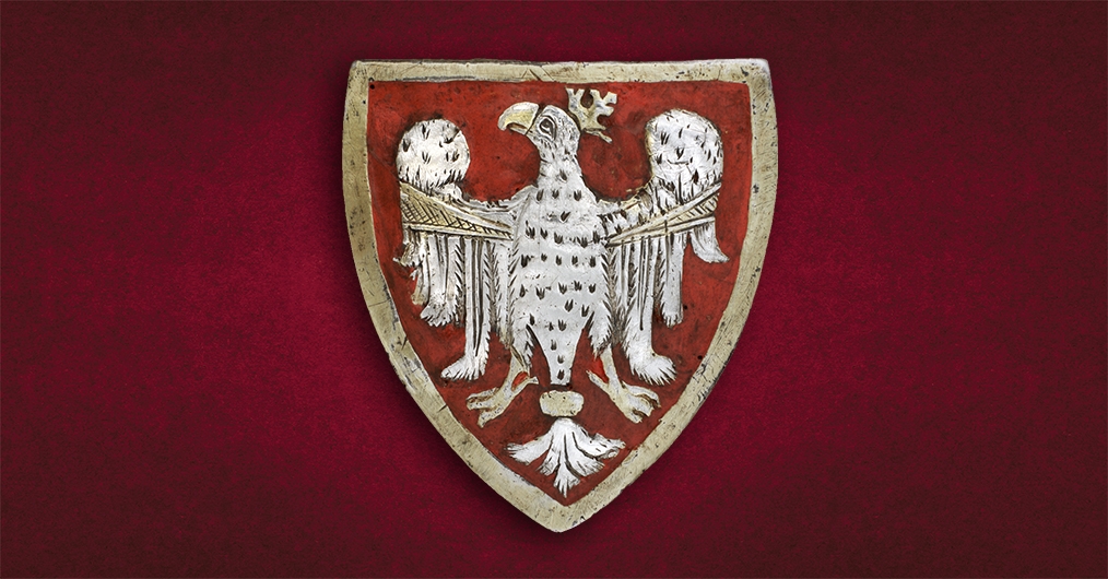 grafika przedstawiająca stylizowanego orła; fragment ze Szczerbca