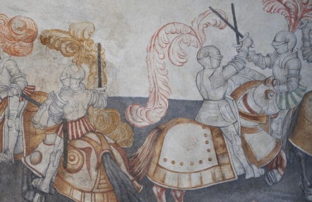 fragment malowidła ściennego, ukazującego turniej rycerski, rycerze w śrdniowiecznych zbrojach walczą konno