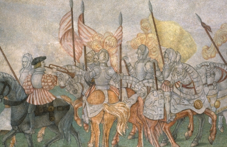 malowidło ścienne przedstawiające grupę walczących konno rycerzy, osłoniętych zbrojami, w rękach trzymają piki  – rodzaj uzbrojenia, na hełmach mają pióropusze