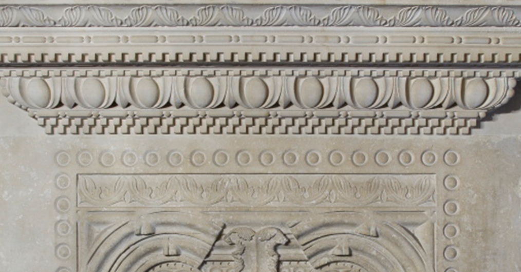 fragment kamiennego portalu wawelskiego, rzeźbionego w motywy geometryczne