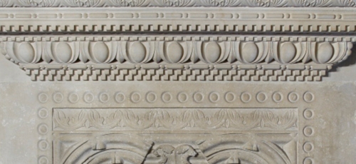 fragment kamiennego portalu wawelskiego, rzeźbionego w motywy geometryczne