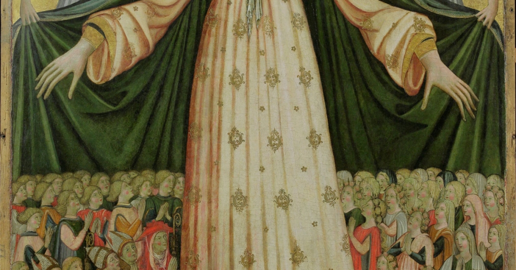obraz przedstawiający postać Matki Boskiej, w rozłożonych rękach trzyma rozchylone poły płaszcza, po obu stronach skrzydlate anioły, pod płaszem chroni się grupa ludzi