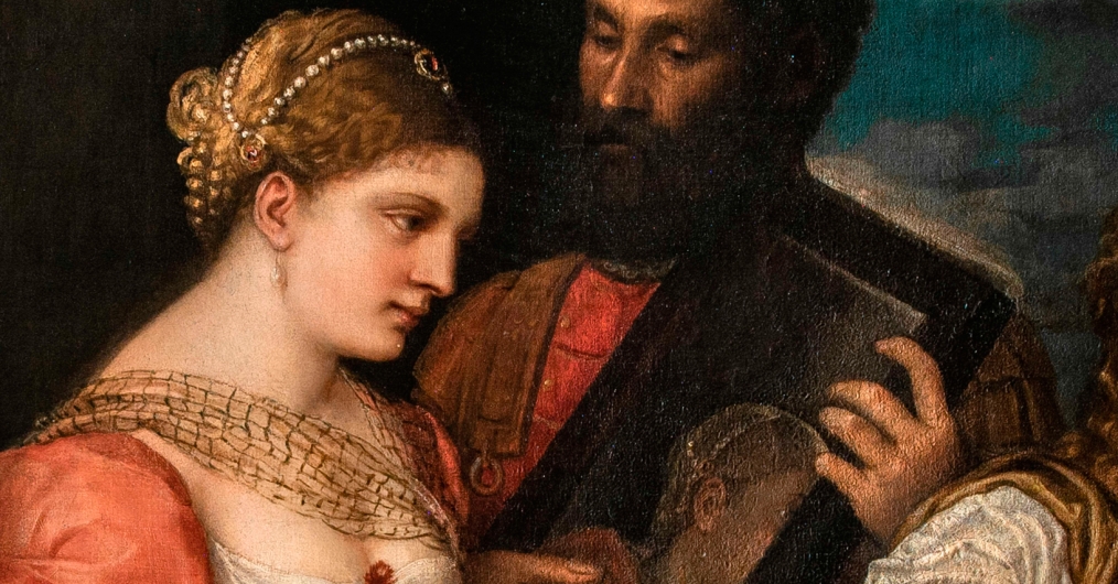 fragment obrazu, przedstawia młodą kobietę, w czerowno-białej sukni, włosy spięte sznurem pereł, z tyłu mężczyzna trzyma lustro, w którym odbija się jej twarz