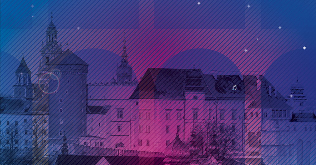 panorama zamku z wysokimi budynkami i wieżami kościoła