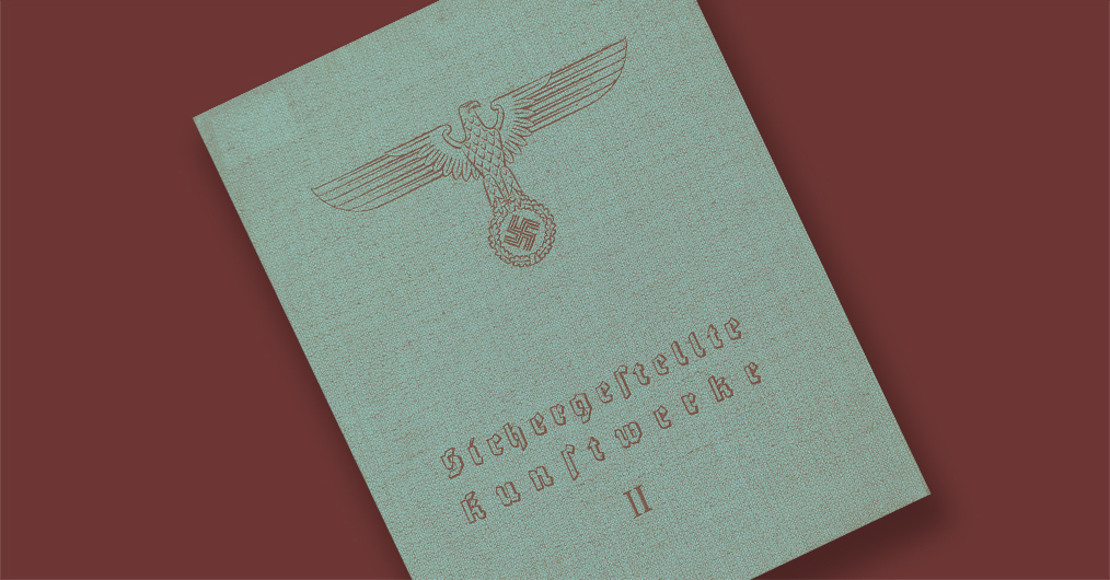 beżowa okładka pudła z napisem w języku niemieckim i hitlerowskim emblematem