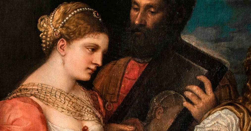 fragment obrazu, przedstawia młodą kobietę, w czerowno-białej sukni, włosy spięte sznurem pereł, z tyłu mężczyzna trzyma lustro, w którym odbija się jej twarz